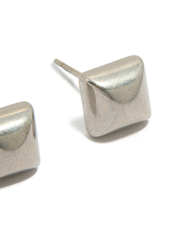 Explore these mens waterproof stainless steel studded earrings with silver finish and stud closure post detail view