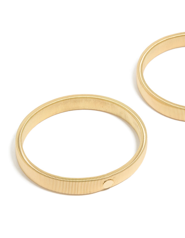Featuring gold stretch sleeve garters in a 2-pack close up view