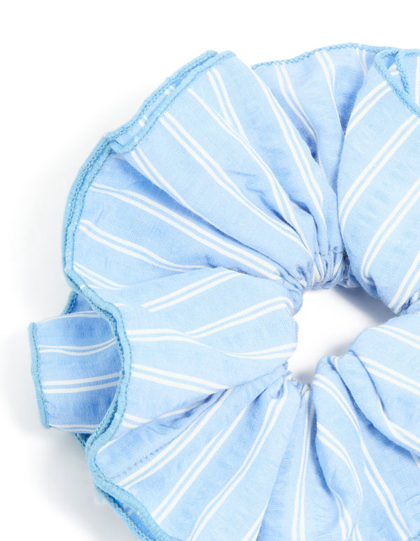 Crafted from pale blue fabric this ruffle scrunchie with white stripe print in a statement style side view