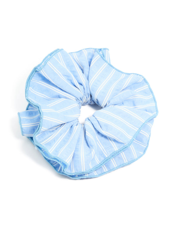 Discover this pale blue fabric ruffle scrunchie with white stripe print in a statement style front view