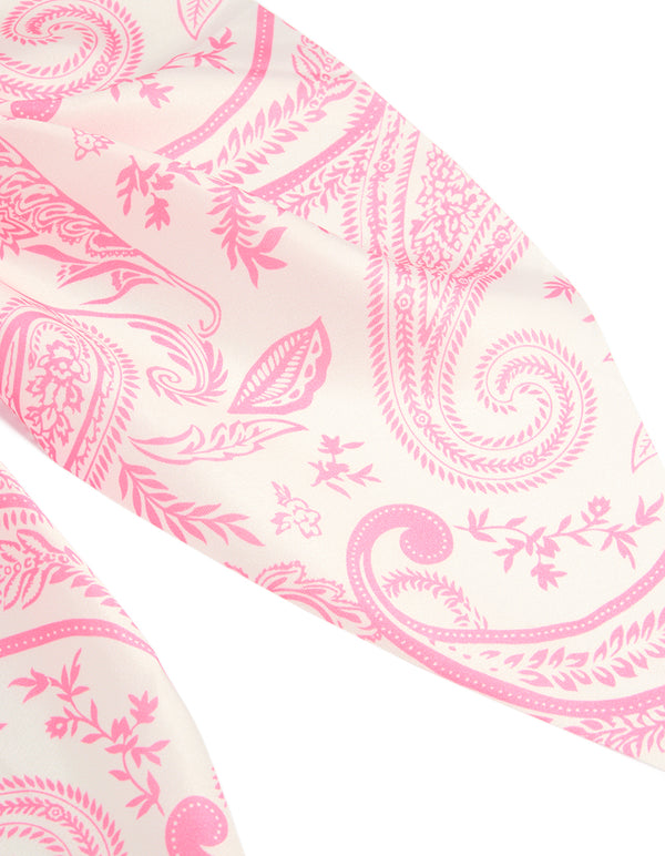 Showcasing a pink boho pattern fabric scarf scrunchie with print in hot pink and misty rose shades detail view