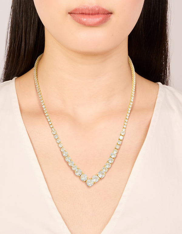 Crafted from gold plated cubic zirconia, this gradient bezel necklace and statement style on neck view