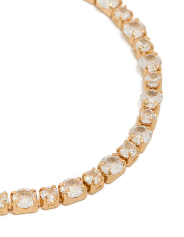 Highlighting a gold plated large square cut cubic zirconia tennis bracelet close up view