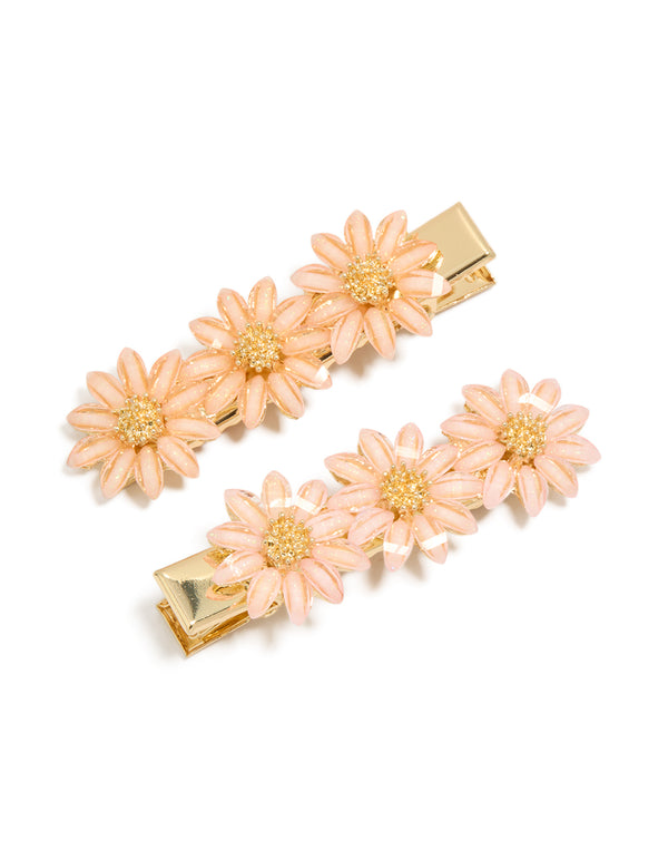 Featuring pink daisy hair clips with glitter centre in a 2-pack front view