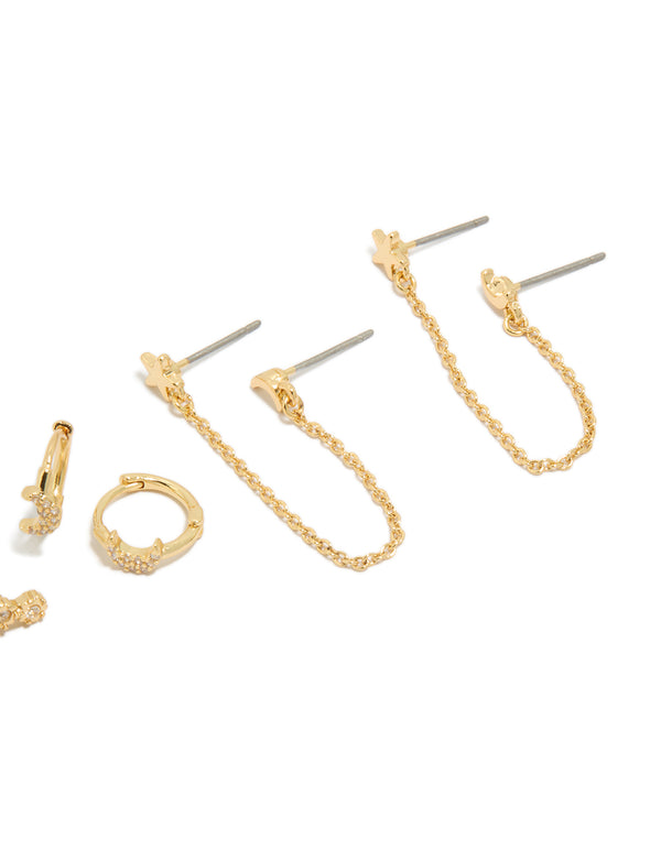 Capturing gold plated celestial moon earrings with cubic zirconia, star accents in a 4-pack including huggie and stud closures post detail view