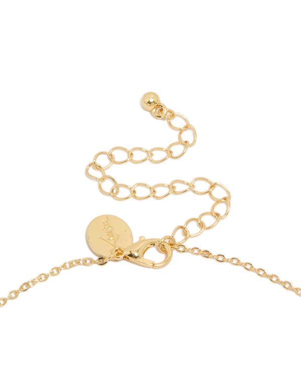 Highlighting a gold plated cubic zirconia alternating Y-necklace in statement style clasp detail view