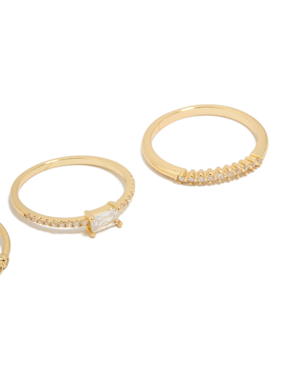 Highlighting gold plated cubic zirconia square bezel rings with statement stackable design close up view