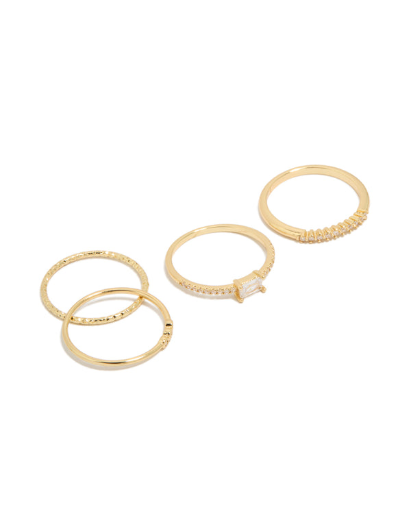Showcasing gold plated cubic zirconia square bezel rings in a statement stackable 4-pack front view