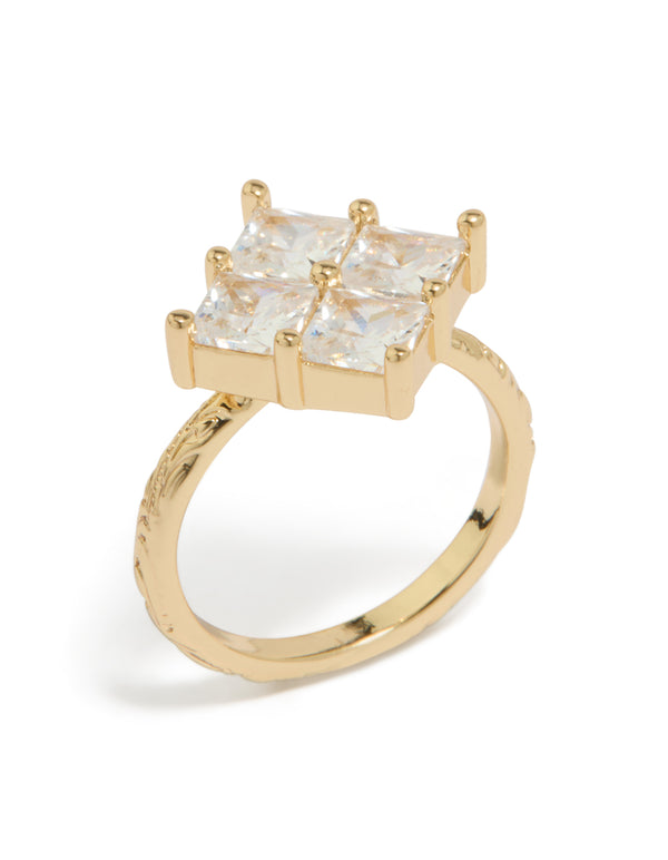 Crafted from gold plated metal with cubic zirconia textured square statement ring in clear front view