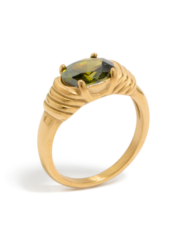 Designed with oval cut green cubic zirconia, this waterproof ring in dainty gold plated stainless steel featuring crystal accents front view
