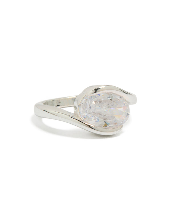 Showcasing a statement silver plated cubic zirconia large round swivel ring side detail view