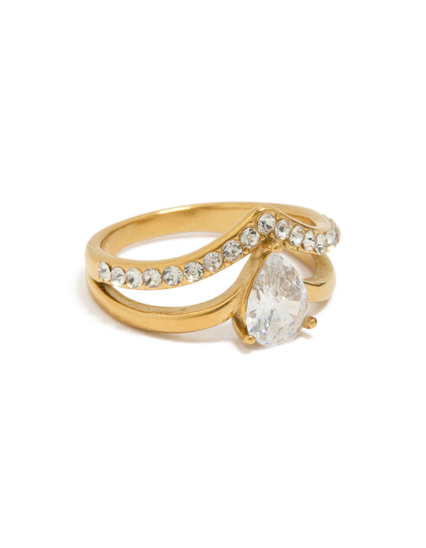 Showcasing a waterproof gold plated stainless steel ring featuring pear cut cubic zirconia in a statement layered design front view
