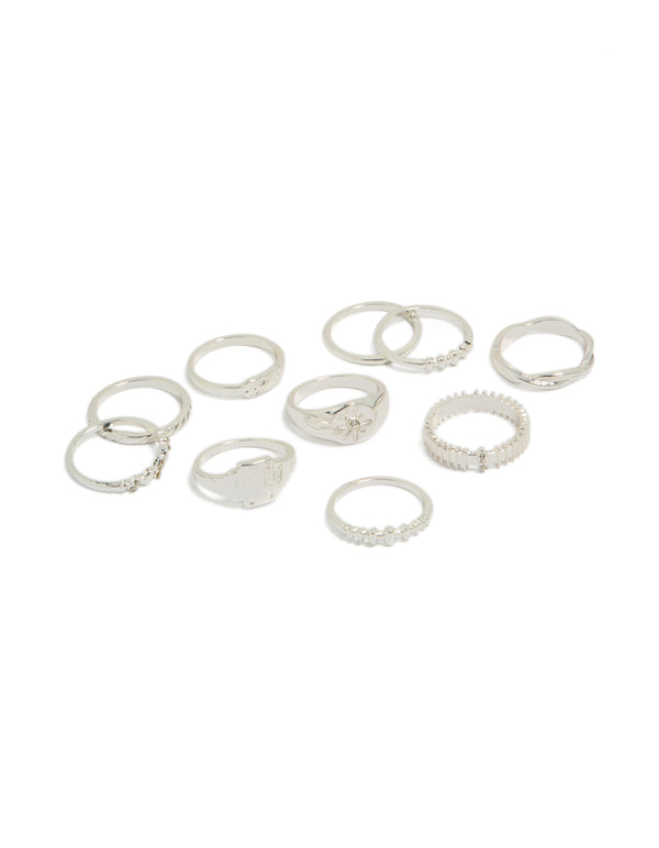 Showcasing a silver diamante and signet rings 10-pack with celestial star features front view