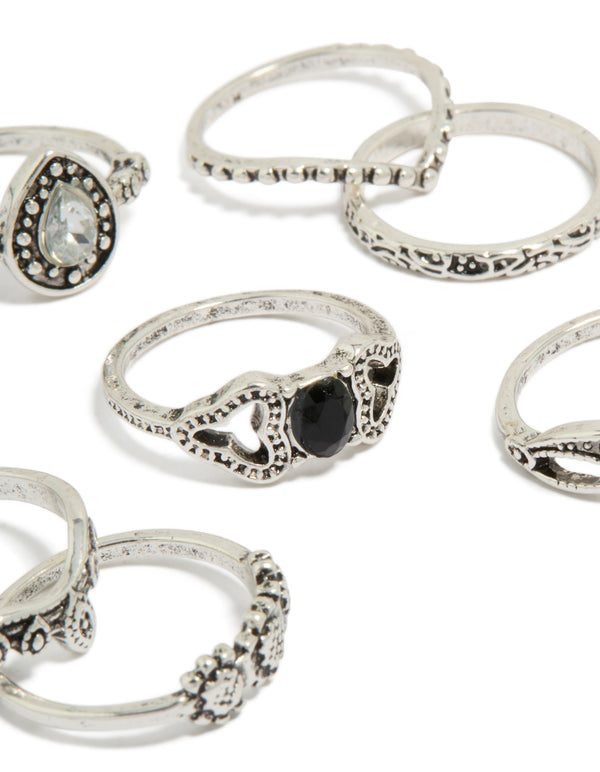 Exquisitely designed antique silver diamante signet rings in an 8-pack close up view