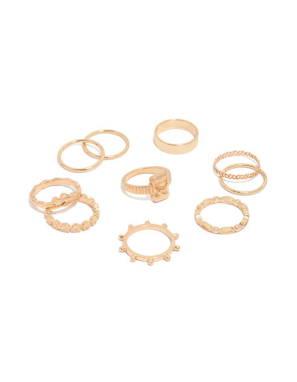 Showcasing a gold mixed textured signet rings 10-pack featuring beaded, oval and chunky styling front view