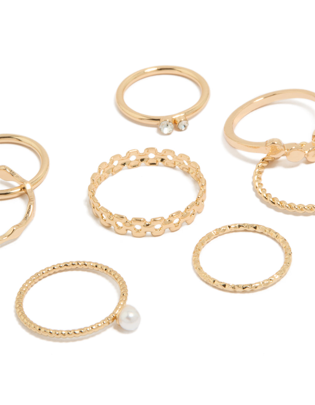 Crafted with gold pearl and thin mixed stacking rings featuring dainty details in a 3-pack close up view