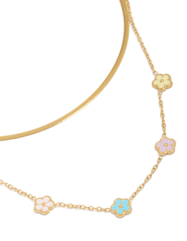 Showcasing a waterproof snake chain layered necklace with floral charm in gold plated stainless steel close up view