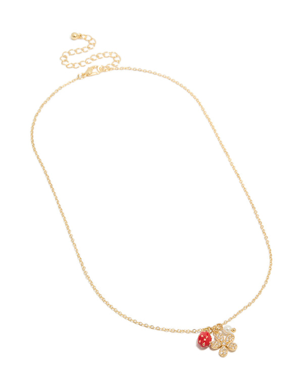 Beautifully crafted gold plated strawberry and flower charm necklace featuring fruit inspired charms with cubic zirconia and pearl accents, front view