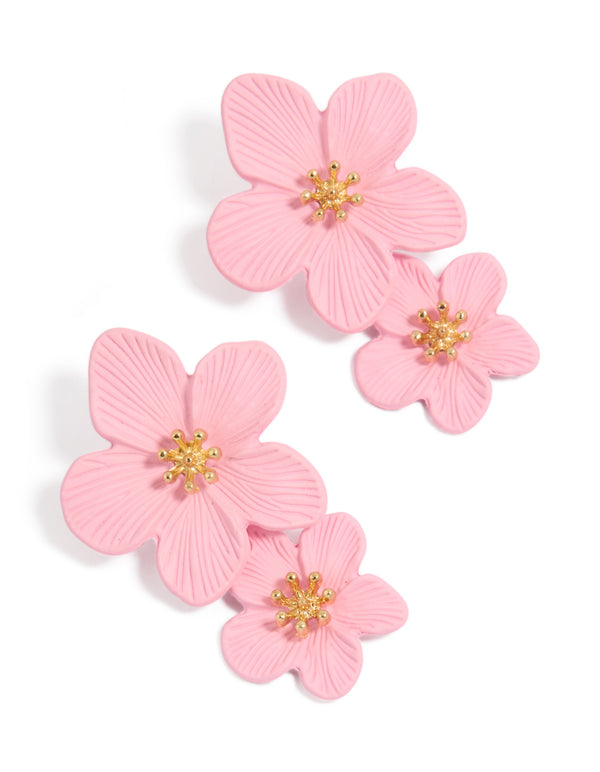 Showcasing gold double pink flower earrings with beaded in statement style front view