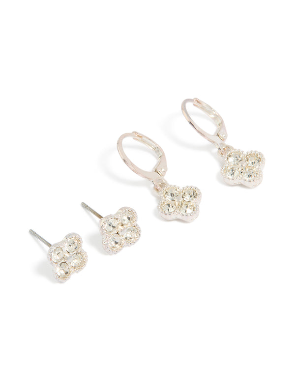 Showcasing floral diamante stud and huggie earrings set in silver with clear stones, 2-pack front view