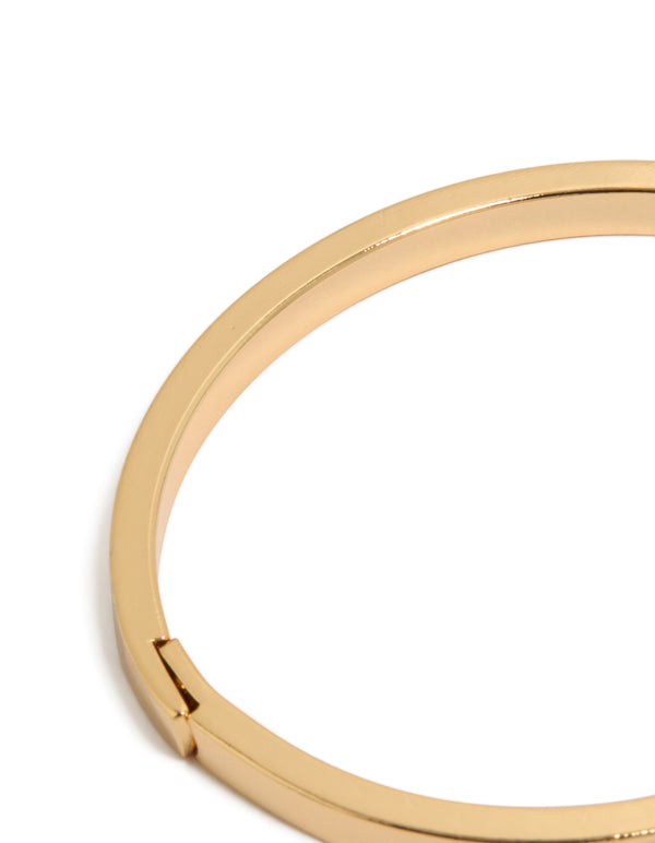 Featuring gold plated diamante circle inlay bangle with stones closure detail view