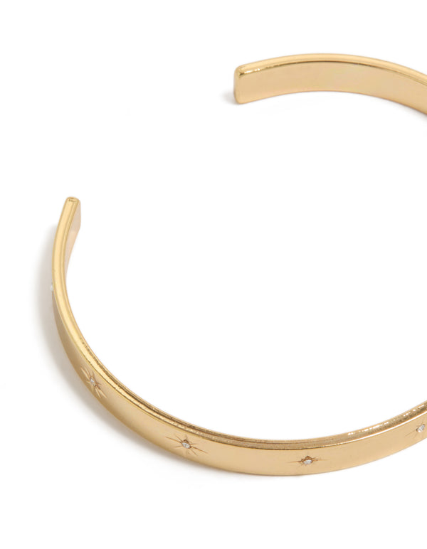 Featuring a celestial star diamante wrist cuff with gold plated detailing closure detail view