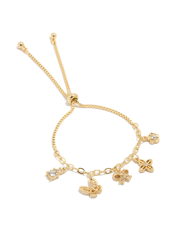 Featuring a gold plated diamante butterfly, bow charms toggle bracelet front view