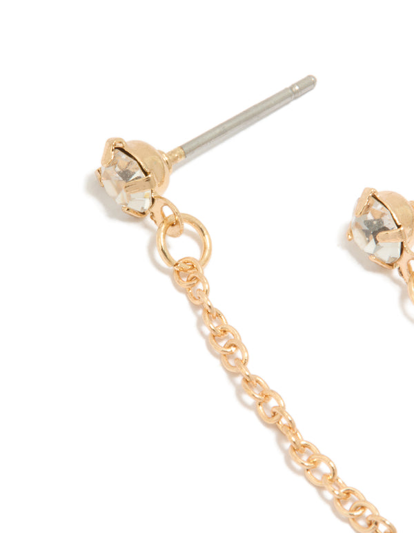 This gold diamante and chain stud earring showcases a statement style with secure closure close up view