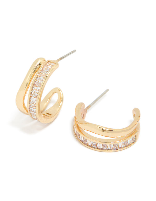 Showcasing statement style hoop earrings with baguette cut stones in gold plated wave layered design front view