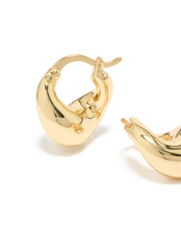 Explore gold plated wavy statement hoop earrings with closure detail close up view
