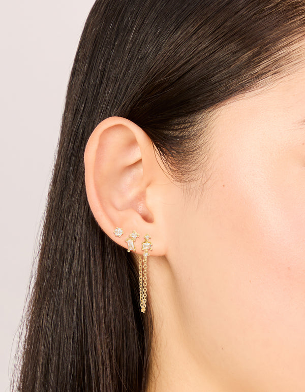 Beautifully styled gold plated boho chain and stud earrings 3-pack with baguette cut cubic zirconia crystals on ear view