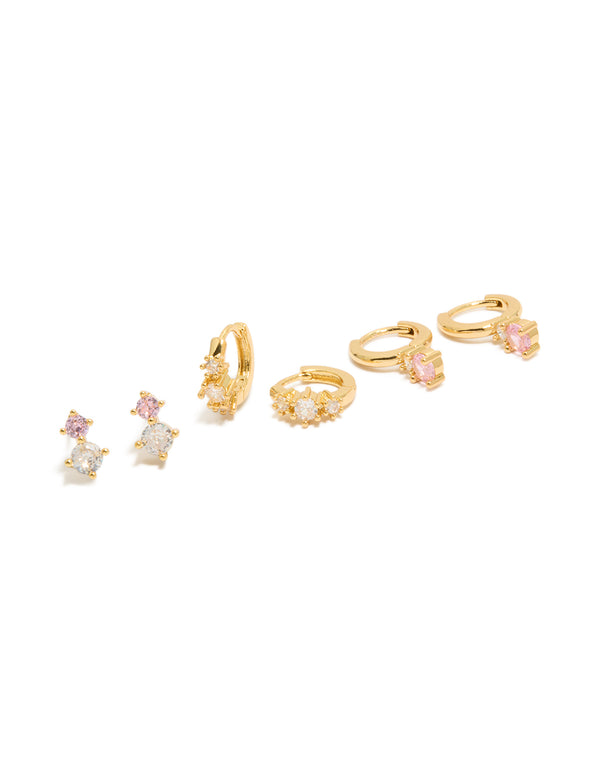 Featuring a 3-pack of mini double cubic zirconia studs and huggie earrings with crystal accents in gold plated finish front view
