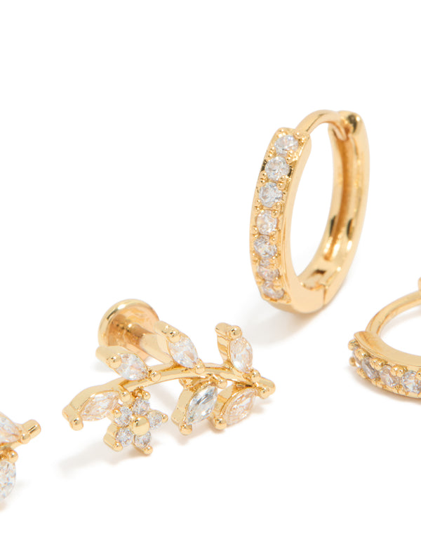 Featuring gold plated brass vine flat back studs and huggie earrings pack with leaf design and cubic zirconia in a close up view