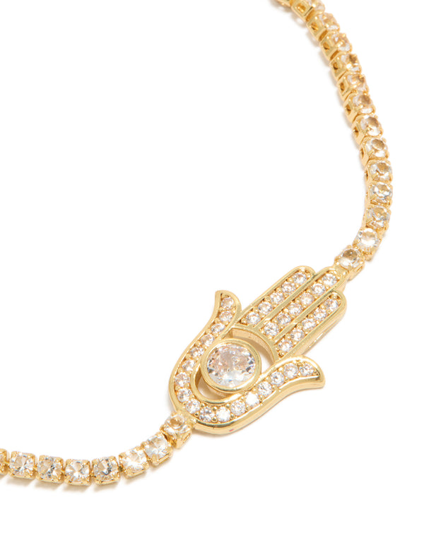 Designed with gold plated cubic zirconia, this hamsa hand toggle bracelet in a statement style close up view