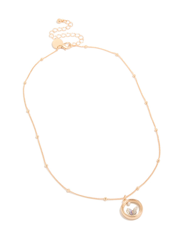 Beautiful butterfly in circle pendant necklace with balls, pearl and gold accents front view