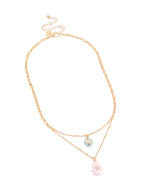 Featuring a gold acrylic and diamante pendant layered necklace front view