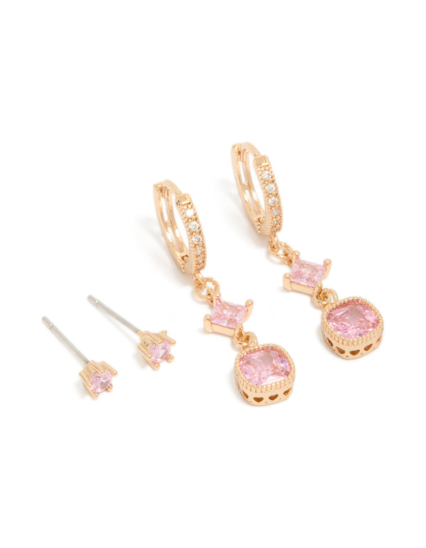 Beautifully designed gold pink cubic zirconia stud and huggie earrings 2-pack featuring charm details with crystal accents front view