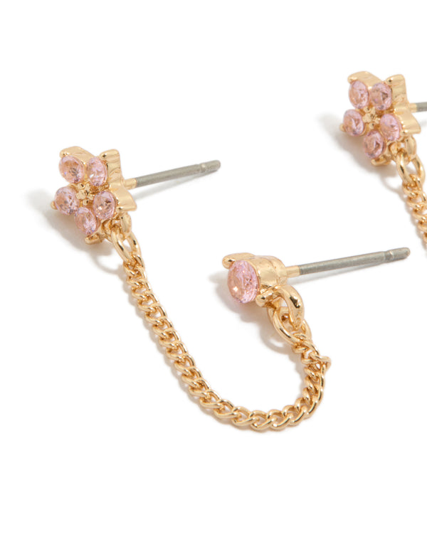 Showcasing gold pink cubic zirconia chain flower and huggie earrings pack with floral featuring crystal embellishments and stud closures close up view