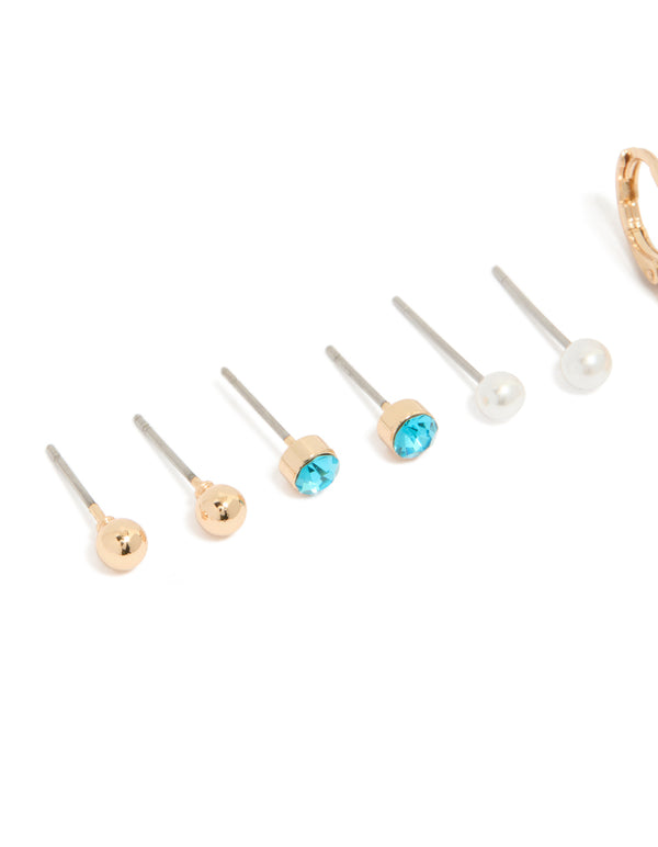 Crafted from gold, these sea life stud earrings showcase turquoise beads, pearl accents, and shell charms in a 6-pack close up view