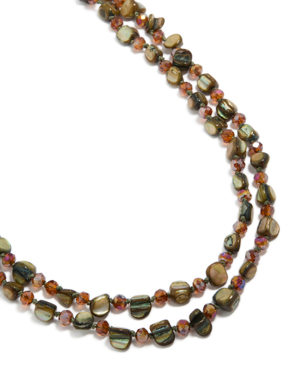 Featuring a green irregular beaded double layered long necklace with olive, darkolivegreen, brown and coral tones close up view