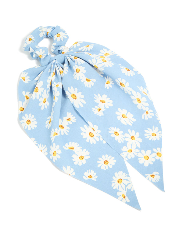 Showcasing a sky blue daisy printed scarf scrunchie with floral print in white and yellow front view