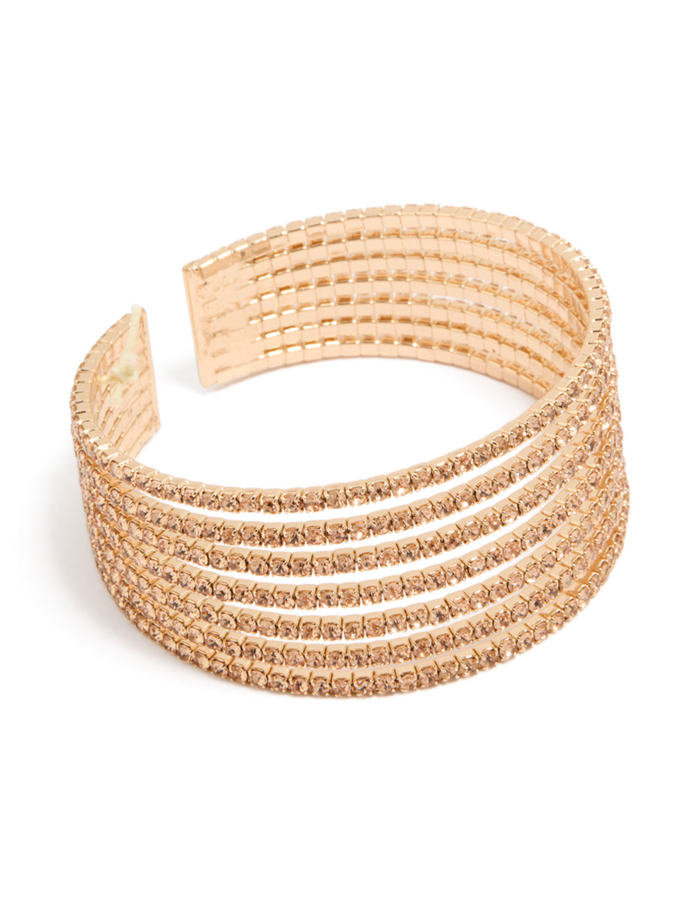 Showcasing a statement layered wrist cuff in gold with diamante detailing and a bangle design, shown in tan front view
