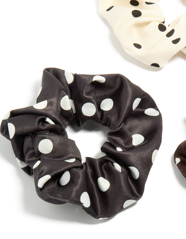 Featuring polka dot pattern scrunchies in a 3-pack with black, ivory, saddle brown, and white detail view