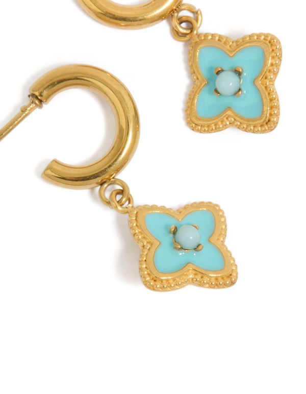 Featuring gold plated stainless steel blue enamel flower hoop earrings close up view