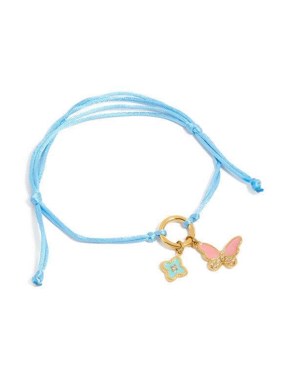 Showcasing a blue cord bracelet with butterfly and floral charms crafted from gold plated stainless steel featuring waterproof enamel in pink and aqua tones front view