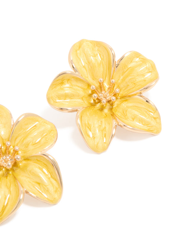 Crafted with detailed petals and textured center, these statement yellow floral stud earrings highlight intricate design post detail view