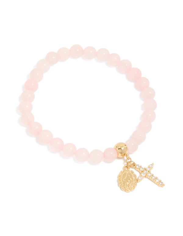 Showcasing a gold plated cubic zirconia Mary cross rose quartz beaded bracelet with charm and crystal front view
