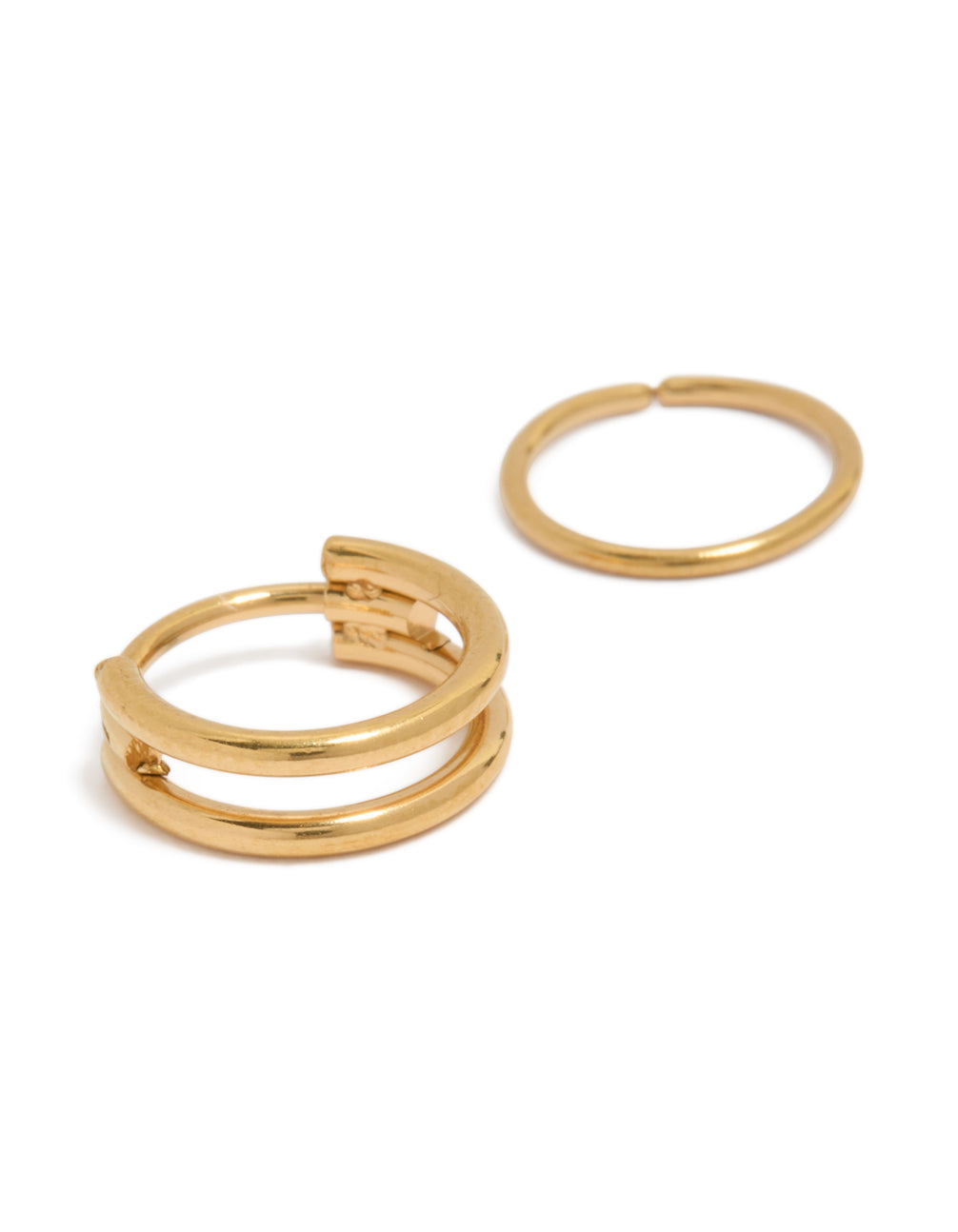Featuring gold plated surgical steel double hinged nose rings in a pack detail view