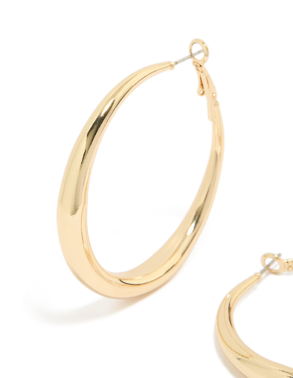 Showcasing gold plated medium hoop earrings with closure close up view