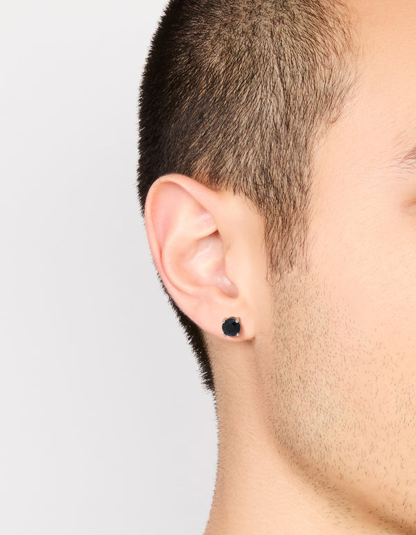 Mens round cut stud earrings with black cubic zirconia in waterproof stainless steel and silver on ear view